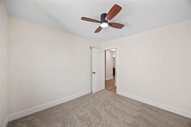 305 S Valley View Dr, Norwalk, IA 50211 - unfurnished room with carpet floors and a ceiling fan