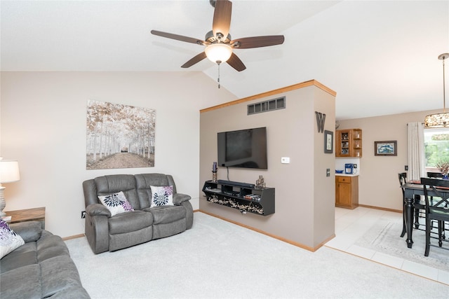 530 N 9th St, Carlisle, IA 50047 - living room featuring vaulted ceiling, ceiling fan, and light colored carpet