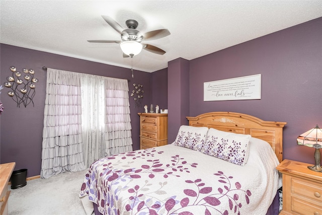 530 N 9th St, Carlisle, IA 50047 - carpeted bedroom with a ceiling fan and baseboards