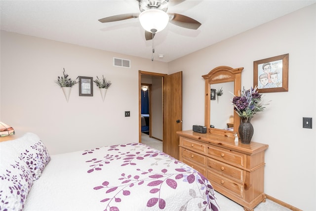 530 N 9th St, Carlisle, IA 50047 - bedroom with light colored carpet and ceiling fan