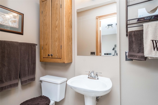 530 N 9th St, Carlisle, IA 50047 - bathroom featuring toilet and a sink