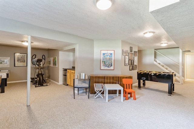 4709 Colt Dr, West Des Moines, IA 50265 - recreation room with a textured ceiling and light carpet