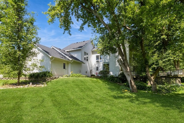 4709 Colt Dr, West Des Moines, IA 50265 - view of grassy yard featuring a wooden deck