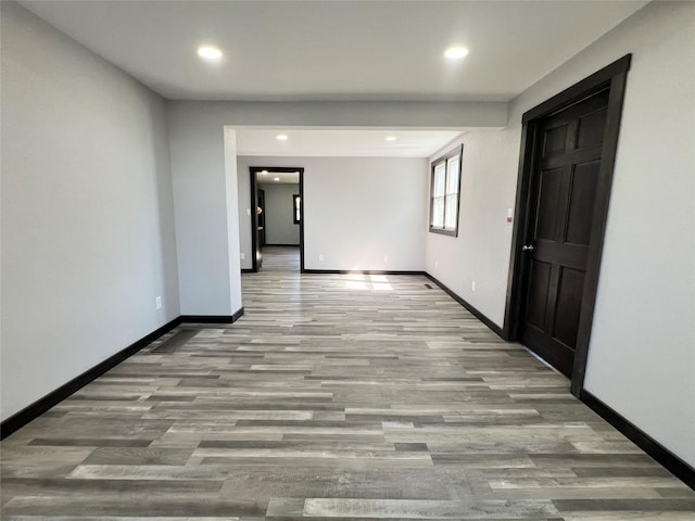 6285 E 28th St N, Newton, IA 50208 - empty room with recessed lighting and wood finished floors
