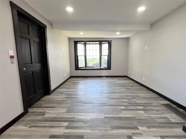 6285 E 28th St N, Newton, IA 50208 - empty room featuring recessed lighting and wood finished floors