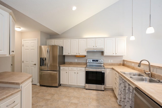 3305 SE Glenstone Dr Unit 172, Grimes, IA 50111 - kitchen with appliances with stainless steel finishes, under cabinet range hood, white cabinetry, light countertops, and high vaulted ceiling
