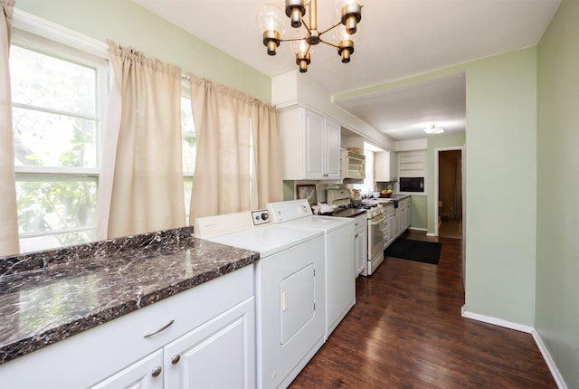 221 9th St, West Des Moines, IA 50265 - laundry room with a chandelier, dark wood-style flooring, and independent washer and dryer