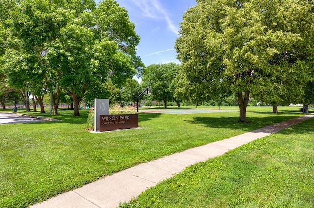 221 9th St, West Des Moines, IA 50265 - surrounding community featuring a lawn and view of scattered trees