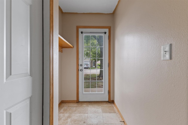 8302 Westown Pkwy Unit 8110, West Des Moines, IA 50266 - entryway featuring light stone finish flooring and a textured wall