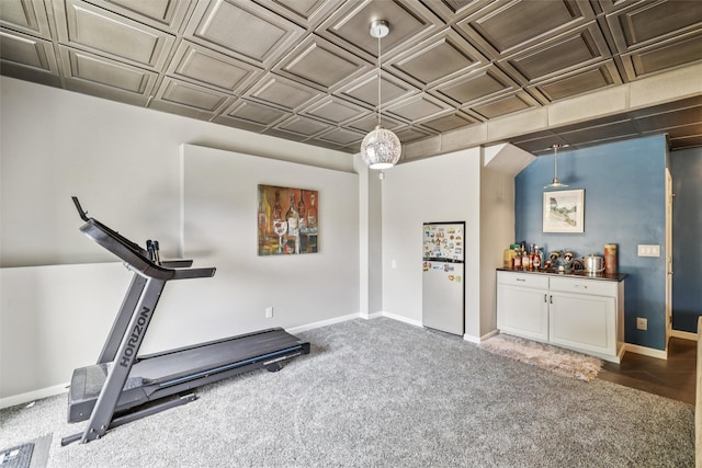 14638 Woodcrest Dr, Clive, IA 50325 - workout room featuring an ornate ceiling and carpet