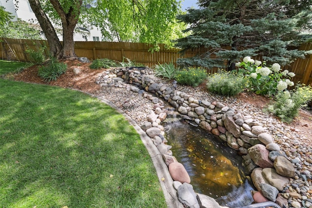 14638 Woodcrest Dr, Clive, IA 50325 - view of yard featuring a small pond