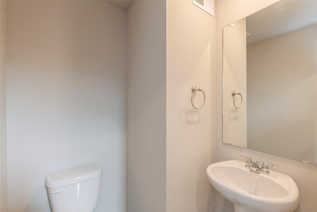 4404 NE 16th St, Ankeny, IA 50021 - bathroom featuring a sink and toilet