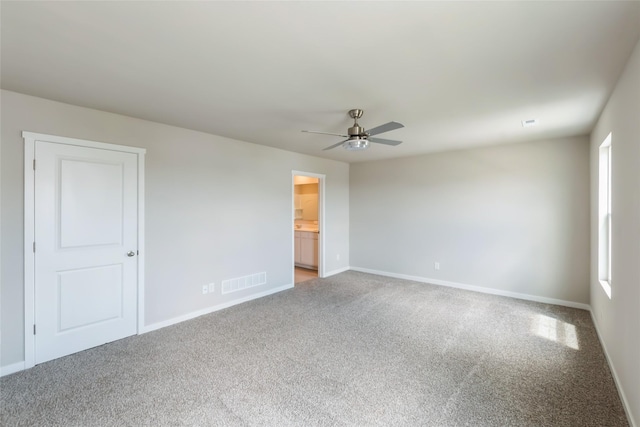4404 NE 16th St, Ankeny, IA 50021 - unfurnished room with a ceiling fan and light carpet