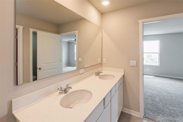 4404 NE 16th St, Ankeny, IA 50021 - bathroom with double vanity, ceiling fan, and recessed lighting