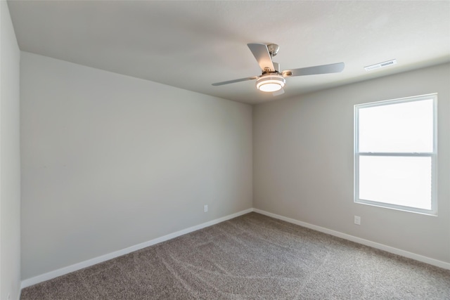 4404 NE 16th St, Ankeny, IA 50021 - carpeted empty room with baseboards and a ceiling fan