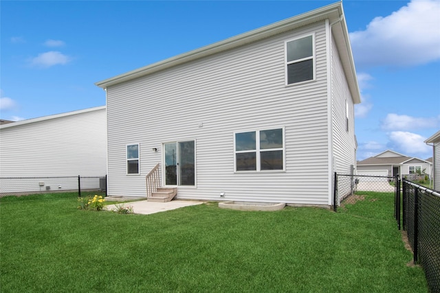 4404 NE 16th St, Ankeny, IA 50021 - rear view of house featuring a fenced backyard, entry steps, and a patio