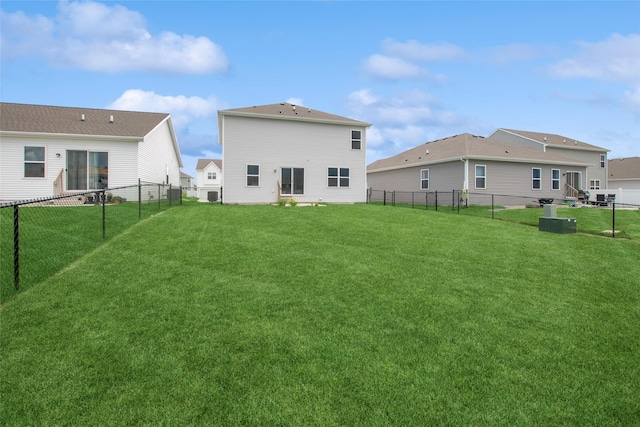 4404 NE 16th St, Ankeny, IA 50021 - rear view of house with a fenced backyard