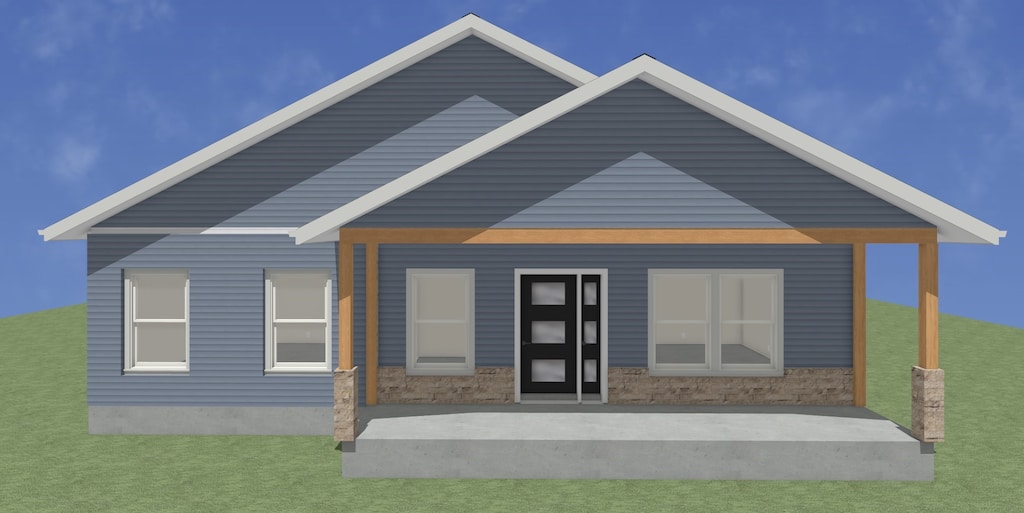 1935 Jewel Dr, Grinnell, IA 50112 - view of front of property with a front yard and stone siding