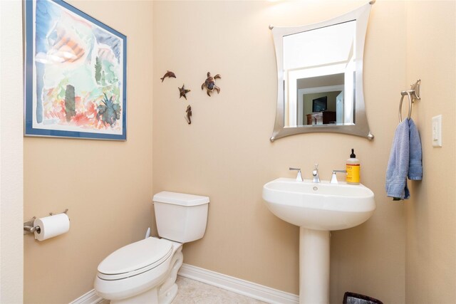 862 Glen Oaks Ter, West Des Moines, IA 50266 - bathroom featuring toilet and tile patterned floors