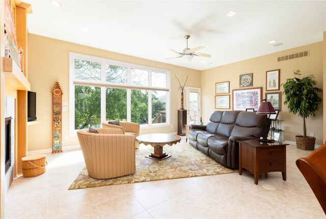 862 Glen Oaks Ter, West Des Moines, IA 50266 - living area with a ceiling fan, recessed lighting, and light tile patterned floors