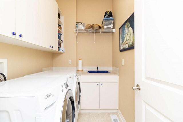 862 Glen Oaks Ter, West Des Moines, IA 50266 - laundry area with cabinet space and washer and dryer
