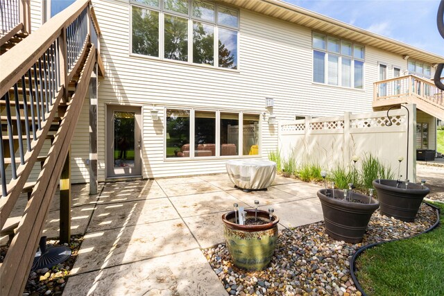 862 Glen Oaks Ter, West Des Moines, IA 50266 - rear view of house with a patio