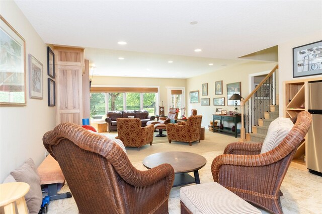 862 Glen Oaks Ter, West Des Moines, IA 50266 - living area with stairway, recessed lighting, and light colored carpet