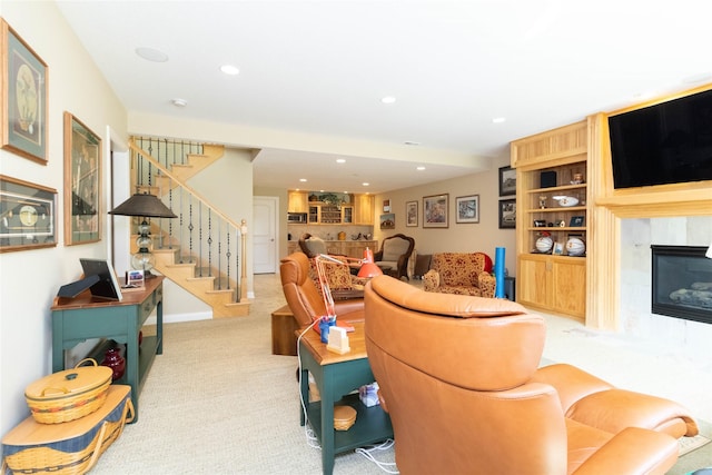 862 Glen Oaks Ter, West Des Moines, IA 50266 - living room with a high end fireplace, carpet, stairs, and recessed lighting