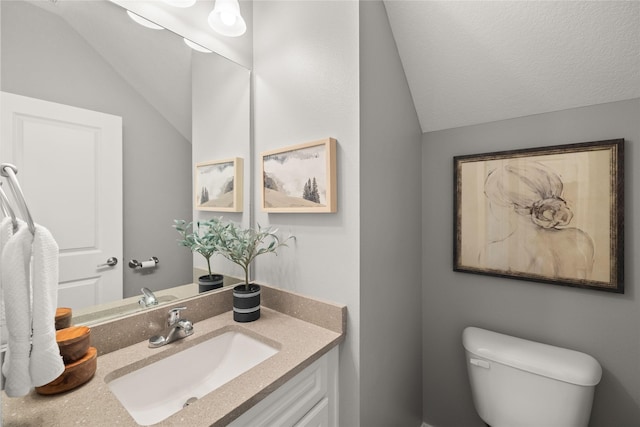 832 Kinney Cir NE, Bondurant, IA 50035 - half bathroom featuring lofted ceiling and vanity