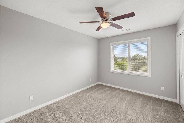 832 Kinney Cir NE, Bondurant, IA 50035 - carpeted empty room featuring baseboards and ceiling fan