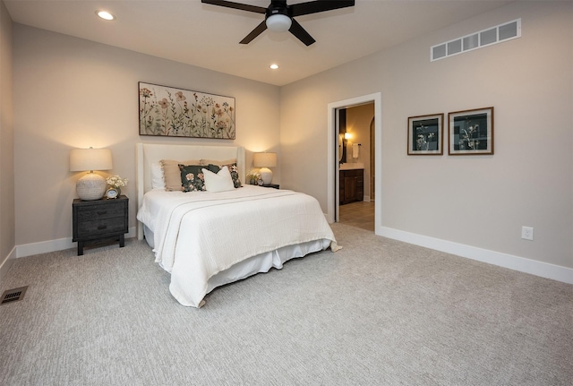 1128 NW 29th Ct, Grimes, IA 50111 - bedroom featuring light carpet, recessed lighting, ceiling fan, and ensuite bath