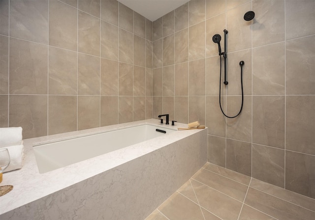 1128 NW 29th Ct, Grimes, IA 50111 - bathroom with a garden tub, tiled shower, and tile patterned floors