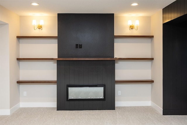 1128 NW 29th Ct, Grimes, IA 50111 - detailed view of carpet, recessed lighting, and a large fireplace