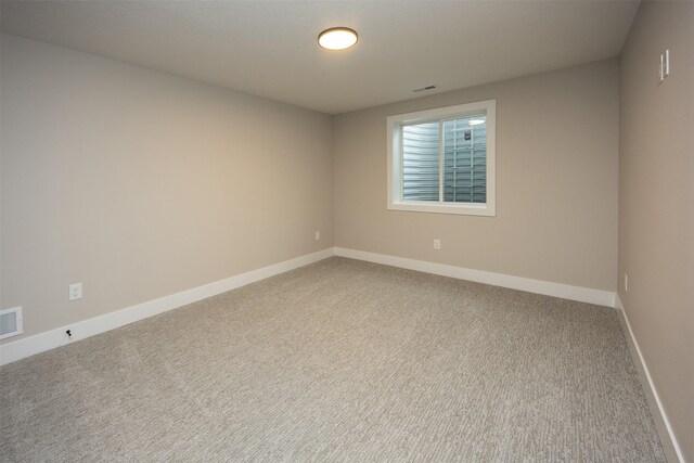 1128 NW 29th Ct, Grimes, IA 50111 - carpeted empty room featuring baseboards