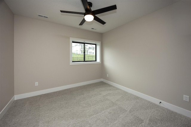 1128 NW 29th Ct, Grimes, IA 50111 - unfurnished room featuring carpet and ceiling fan
