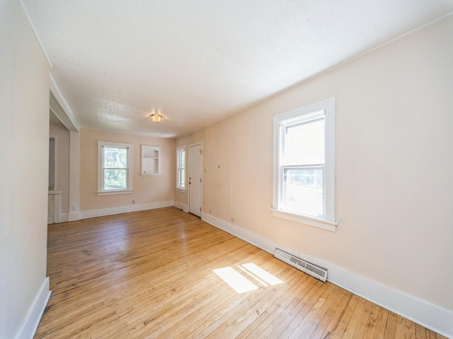 2928 34th St, Des Moines, IA 50310 - unfurnished room with hardwood / wood-style floors and baseboards