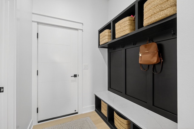 1305 NW 28th St, Grimes, IA 50111 - mudroom featuring light wood-type flooring and baseboards