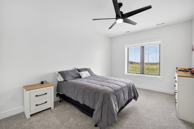 1305 NW 28th St, Grimes, IA 50111 - bedroom featuring light colored carpet and ceiling fan