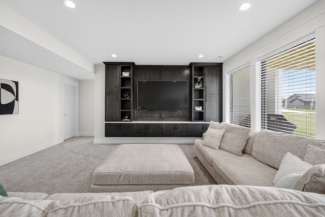 1305 NW 28th St, Grimes, IA 50111 - living area featuring light colored carpet and recessed lighting