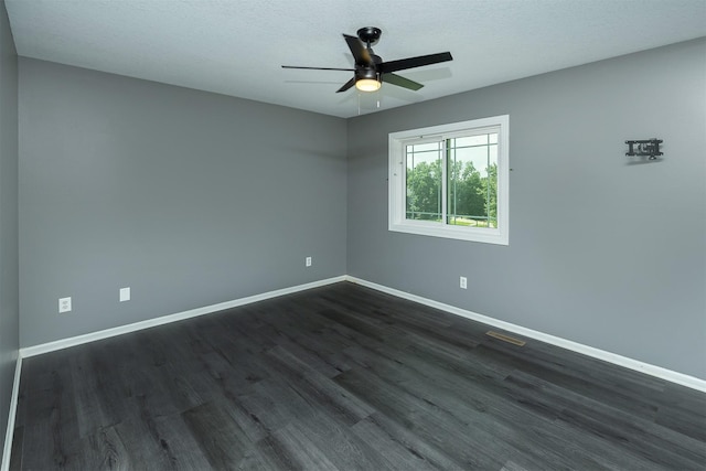 3170 E Kenyon Ave, Des Moines, IA 50320 - empty room featuring dark wood-style floors and ceiling fan