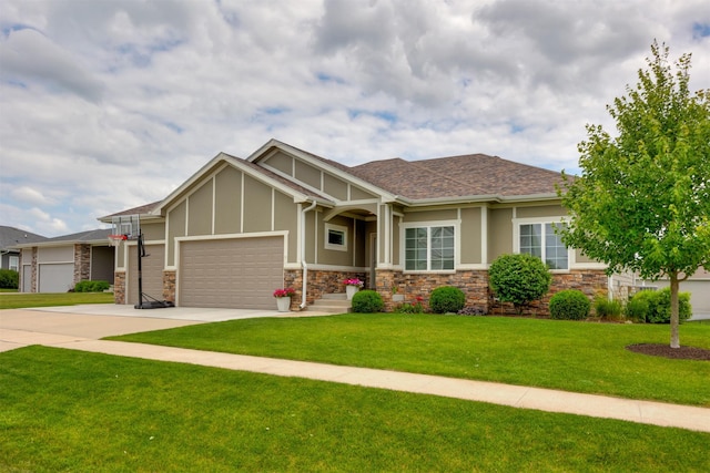 9824 Dunmore Cir, Johnston, IA 50131 - craftsman-style home with a front yard, stone siding, a garage, and concrete driveway