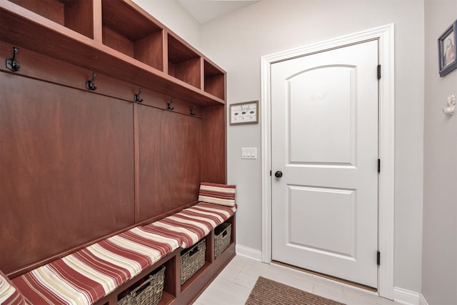 9824 Dunmore Cir, Johnston, IA 50131 - mudroom featuring baseboards and light tile patterned flooring