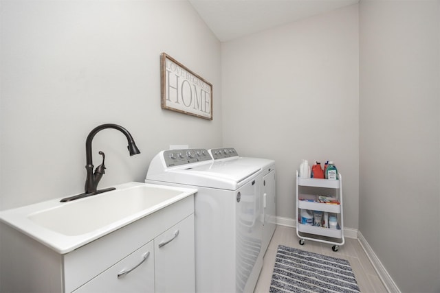 9824 Dunmore Cir, Johnston, IA 50131 - laundry room with independent washer and dryer and cabinet space