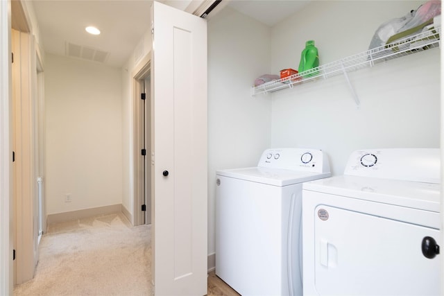 720 Spruce St NW, Bondurant, IA 50035 - washroom featuring separate washer and dryer, light colored carpet, and recessed lighting