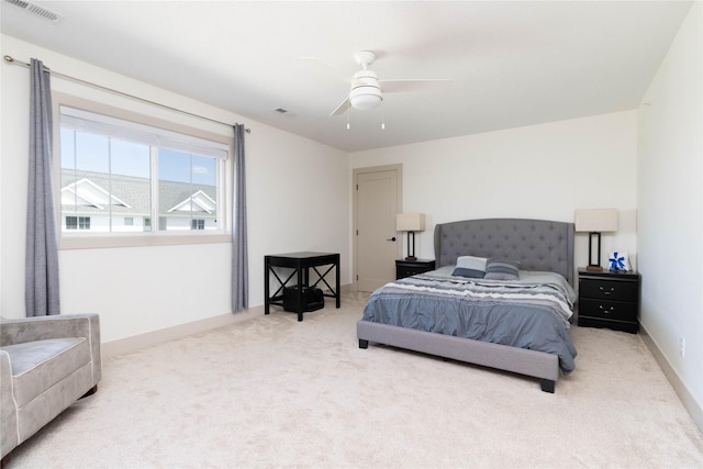 720 Spruce St NW, Bondurant, IA 50035 - bedroom with carpet floors and ceiling fan