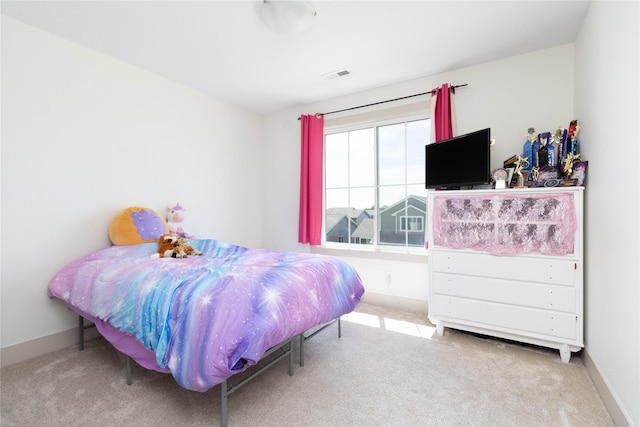 720 Spruce St NW, Bondurant, IA 50035 - carpeted bedroom featuring baseboards