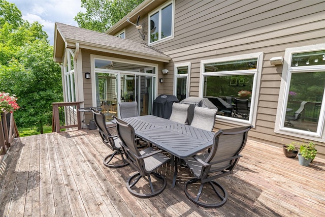 2726 SE 11th St, West Des Moines, IA 50265 - wooden terrace with outdoor dining area and a grill