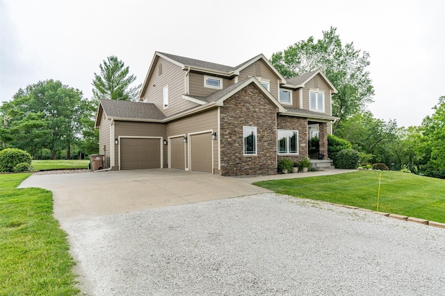 2726 SE 11th St, West Des Moines, IA 50265 - view of front of home with a garage, concrete driveway, a front yard, stone siding, and a shingled roof