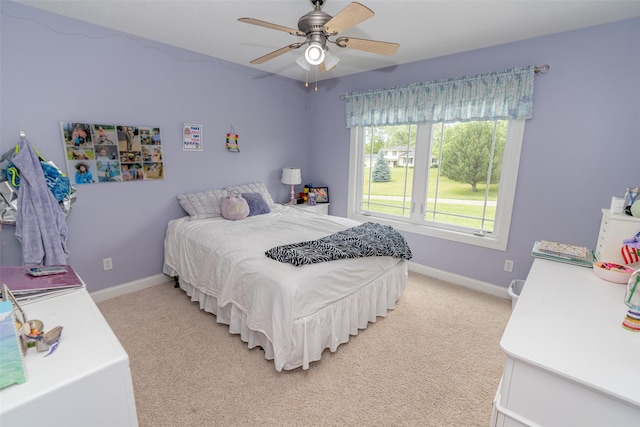 2726 SE 11th St, West Des Moines, IA 50265 - bedroom featuring light carpet and ceiling fan