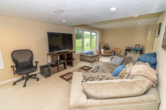 2726 SE 11th St, West Des Moines, IA 50265 - carpeted living room with recessed lighting and a textured ceiling